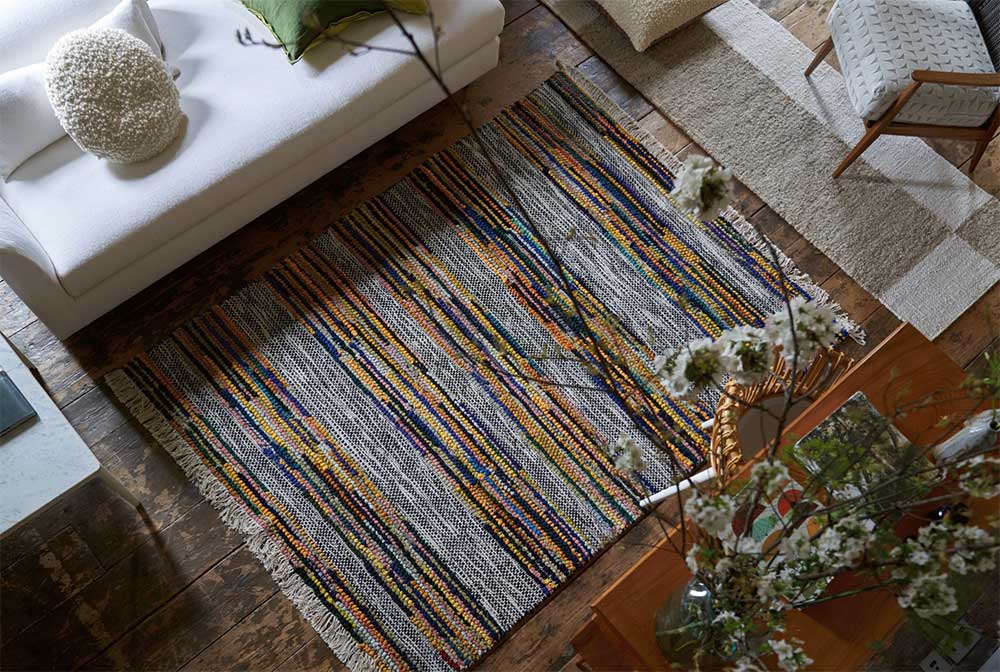 Two rugs on a wooden floor